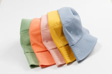 Load image into Gallery viewer, bucket hats in colours lined up green, peach, pink, yellow, blue